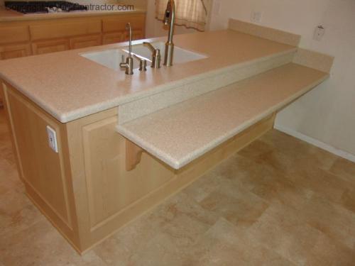 Kitchen with Light Maple Cabinetry and Staron Countertops (1) lg