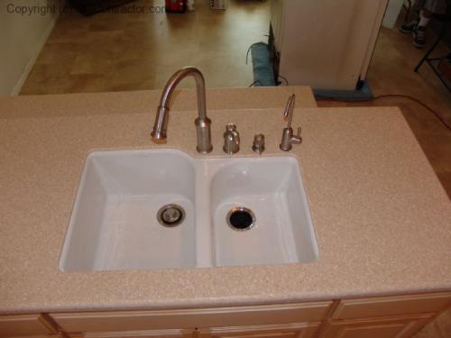 Kitchen with Light Maple Cabinetry and Staron Countertops (3) lg