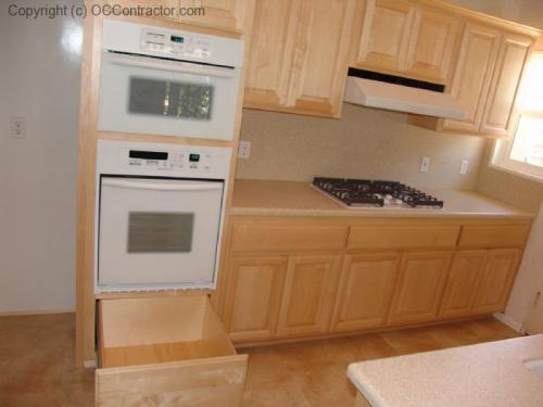 Kitchen with Light Maple Cabinetry and Staron Countertops (6) lg