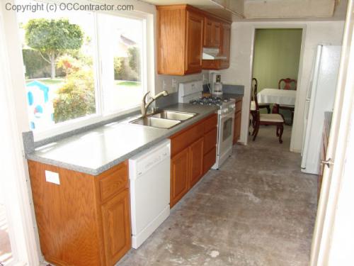 Kitchen with Staron Countertops and Unfinished Floor lg